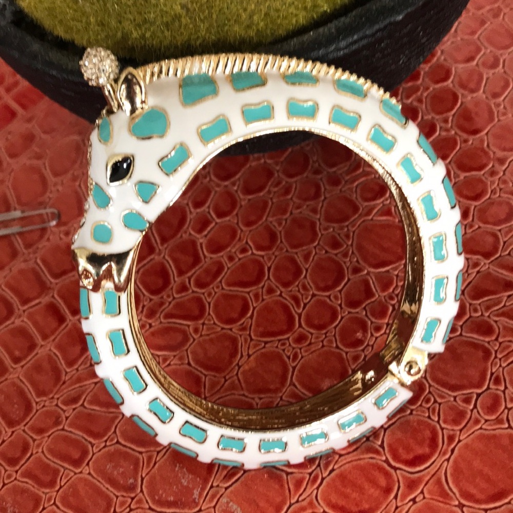 Giraffe hinged cuff bracelet.